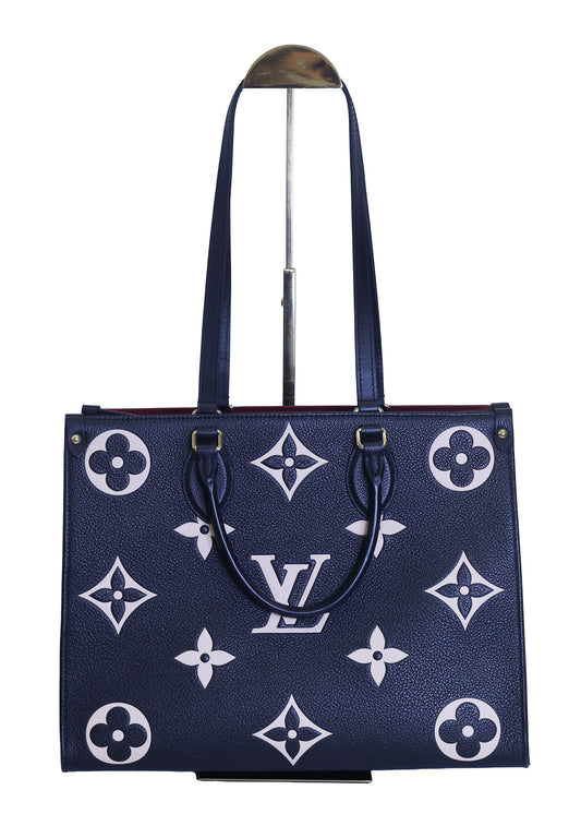 Preloved authentic LOUIS VUITTON On the Go MM M45495 Bicolor Black Monogram Empreinte Leather Tote Bag | Luxe Again Maison