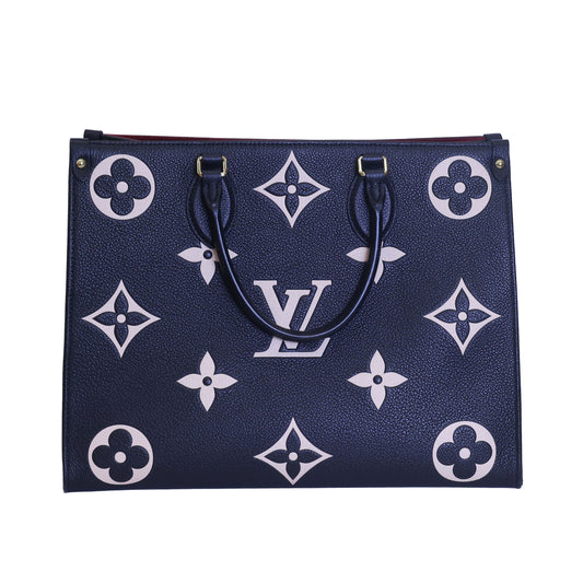 Preloved authentic LOUIS VUITTON On the Go MM M45495 Bicolor Black Monogram Empreinte Leather Tote Bag | Luxe Again Maison