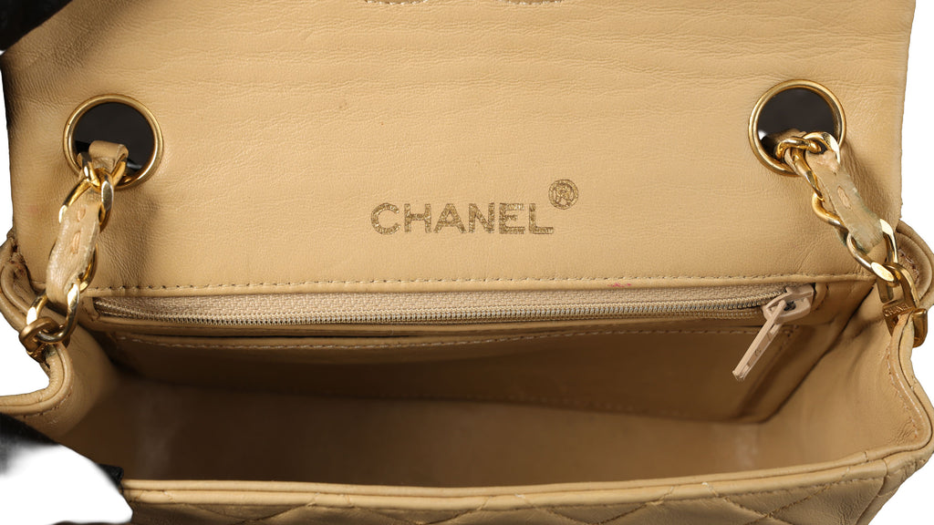 Preowned CHANEL Vintage Mini 17 Matelasse Single Flap Lambskin GHW Beige Bag | Luxe Again Maison