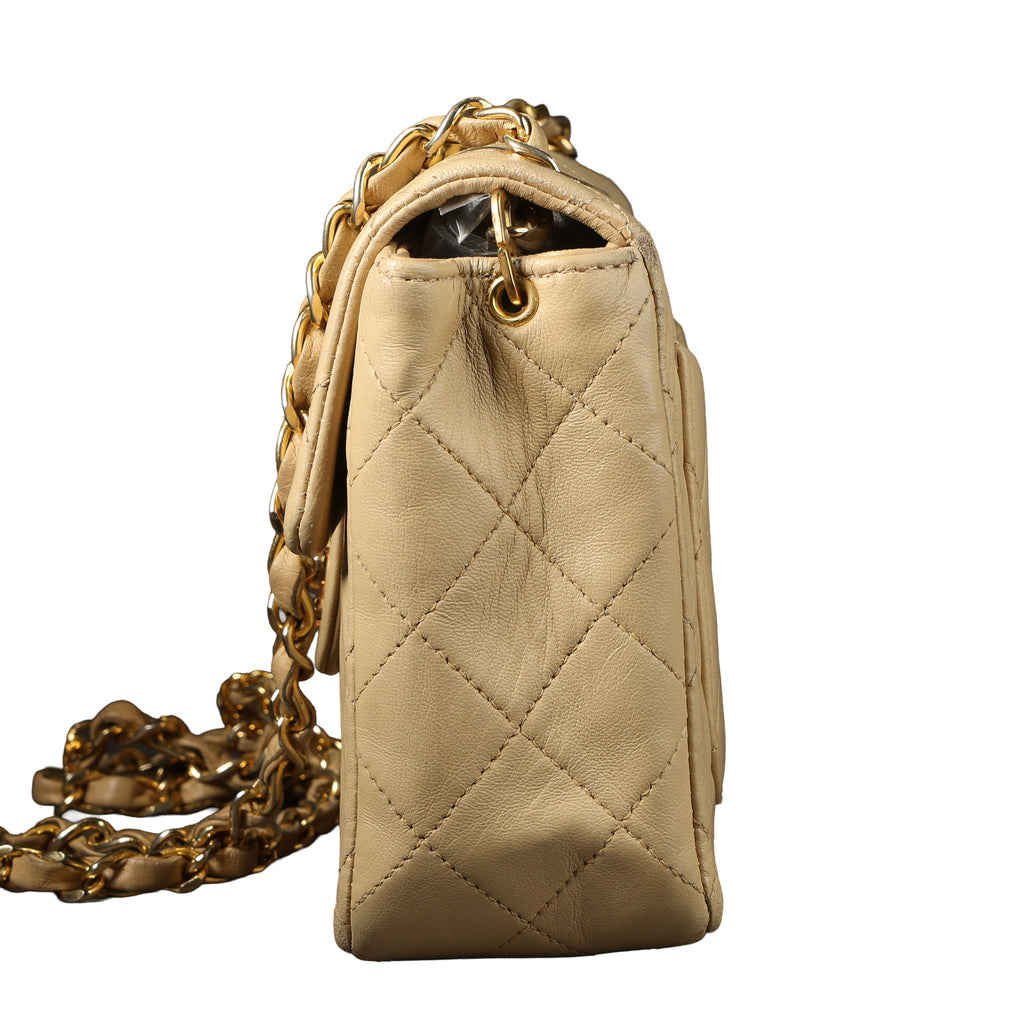 Preowned CHANEL Vintage Mini 17 Matelasse Single Flap Lambskin GHW Beige Bag | Luxe Again Maison