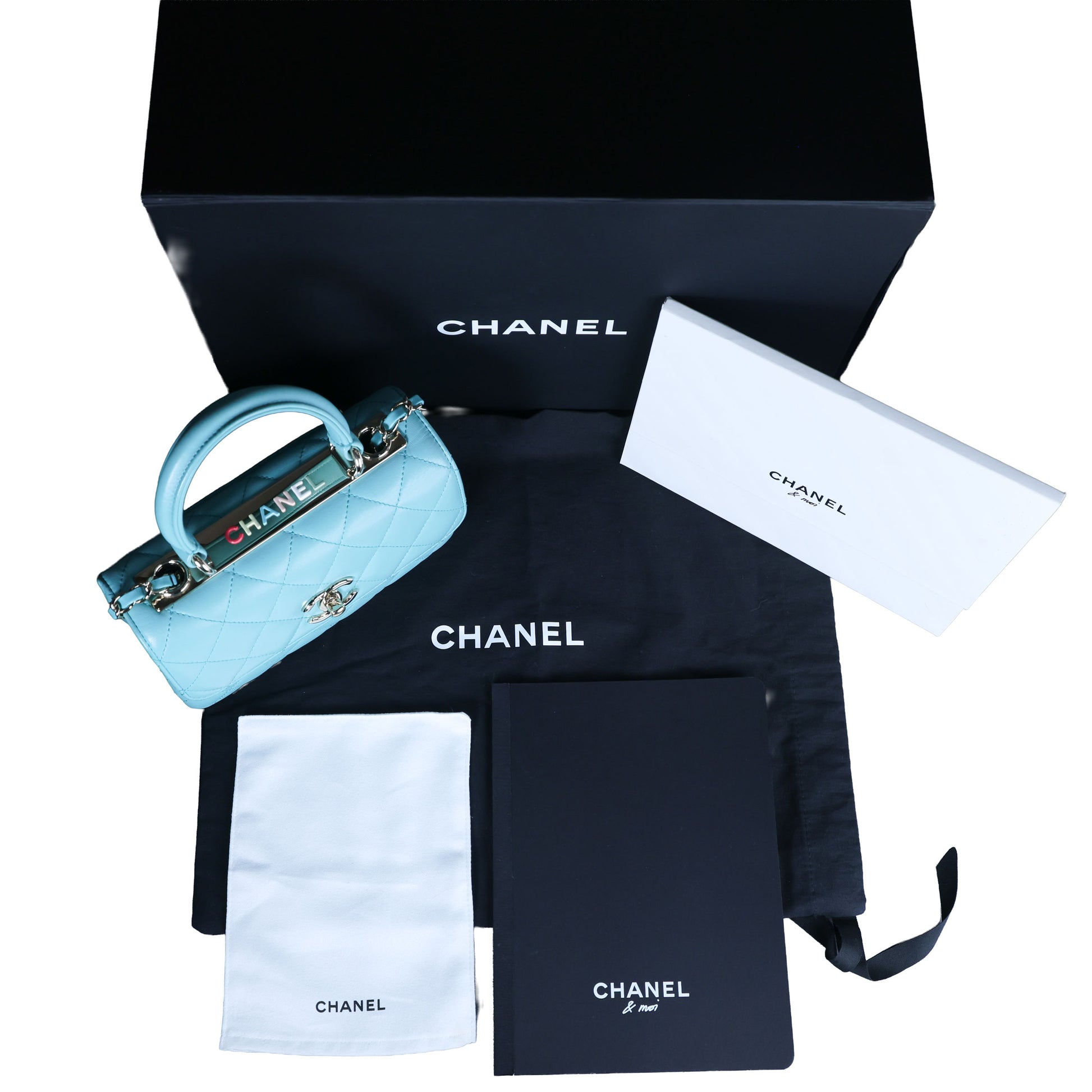 Preowned CHANEL Mini Flap Bag Top Handle Tiffany Blue Lambskin | Luxe Again Maison