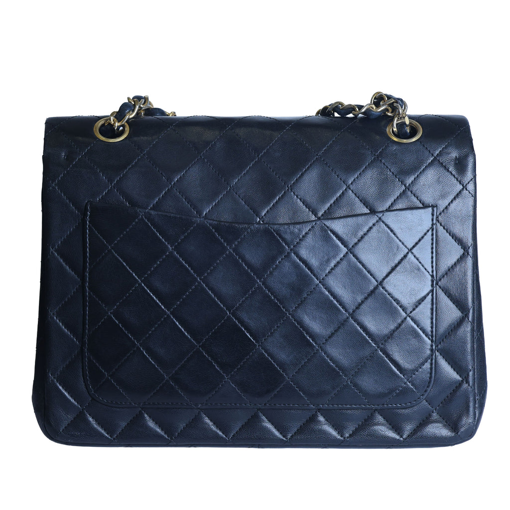 Preowned CHANEL Vintage Classic 11.12 (Medium Double Flap) Handbag Black Gold Hardware 1XXXXX3 | Luxe Again Maison