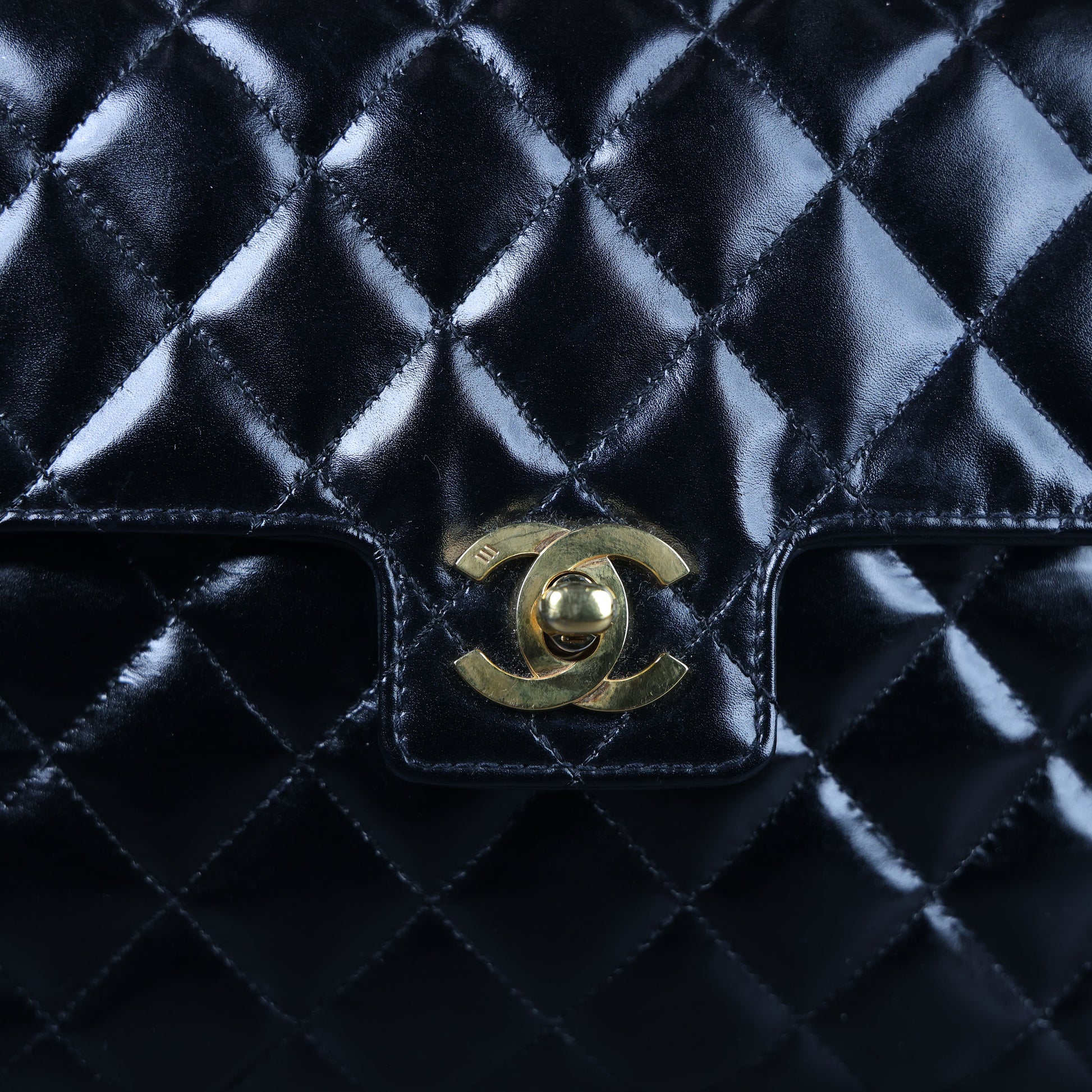 Preowned CHANEL Vintage Kelly Top Handle Matelasse Leather GHW Black | Luxe Again Maison