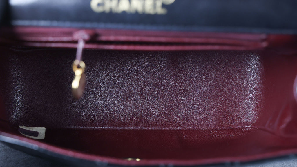 Preowned CHANEL Vintage Kelly Top Handle Matelasse Leather GHW Black | Luxe Again Maison