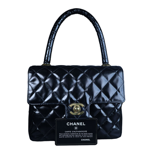 Preowned CHANEL Vintage Kelly Top Handle Matelasse Leather GHW Black | Luxe Again Maison