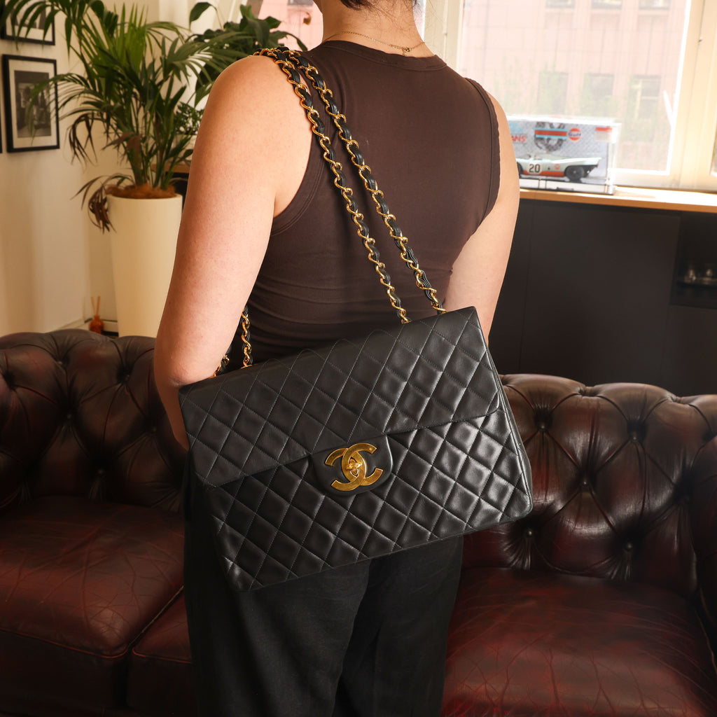 Preowned CHANEL Vintage Matelasse 34 Maxi Classic Flap Black Lambskin GHW 31XXX47 | Luxe Again Maison
