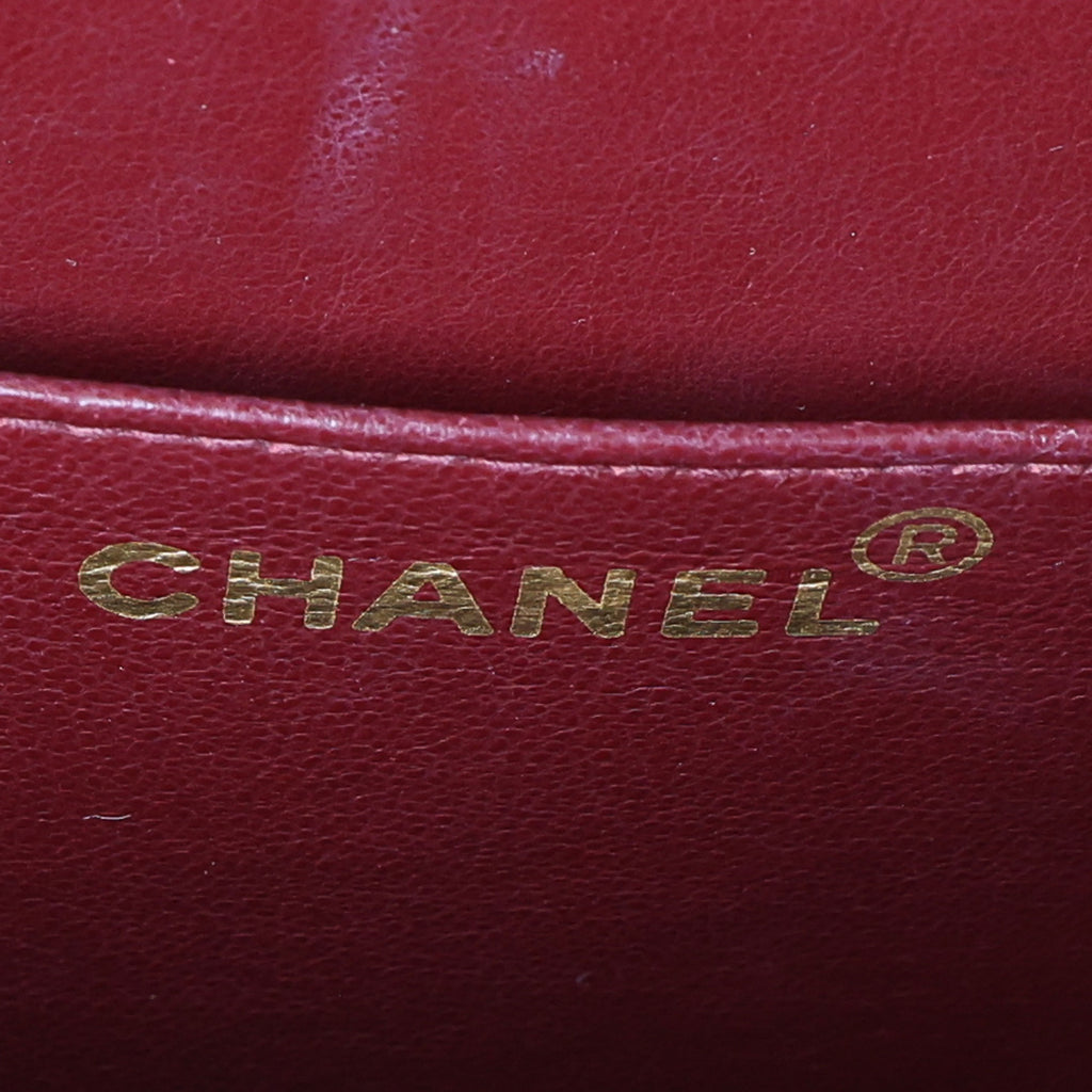 Preowned CHANEL Vintage Matelasse 34 Maxi Classic Flap Black GHW | Luxe Again Maison
