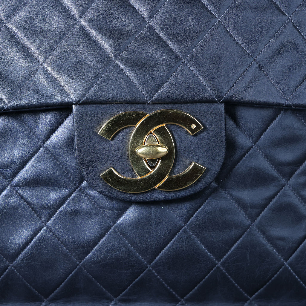 Preowned CHANEL Vintage Matelasse 34 Maxi Classic Flap Black GHW | Luxe Again Maison