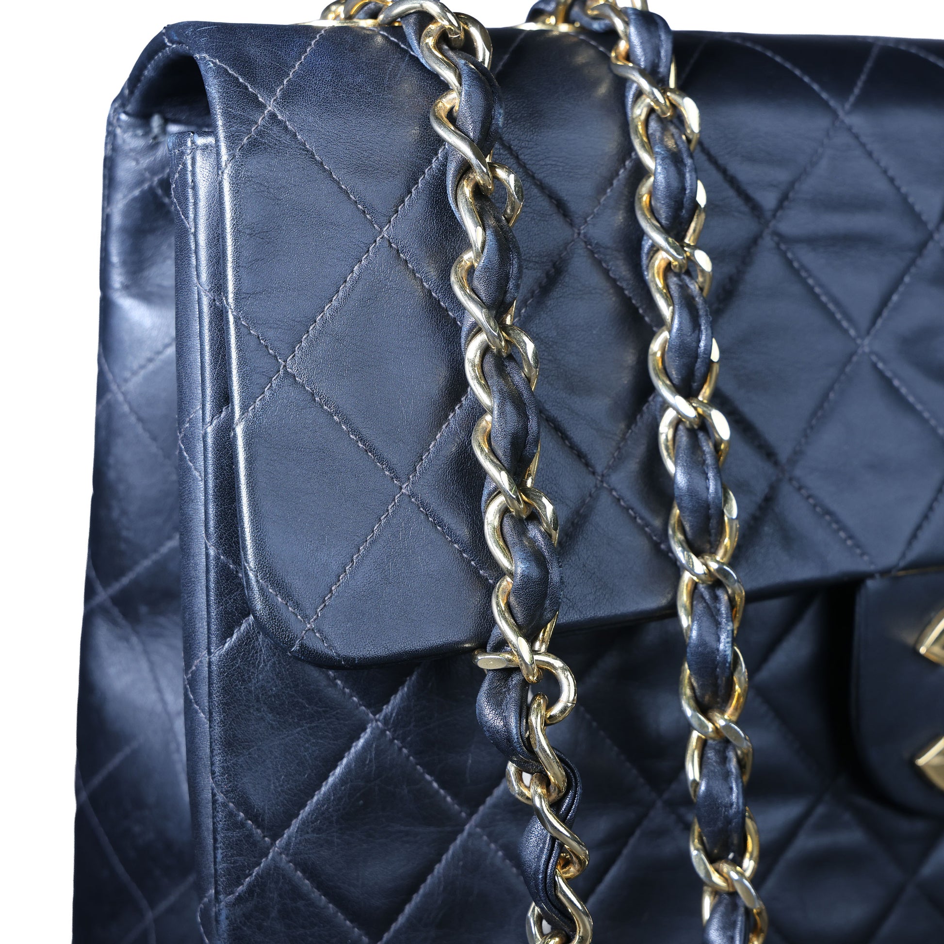 Preowned CHANEL Vintage Matelasse 34 Maxi Classic Flap Black GHW | Luxe Again Maison
