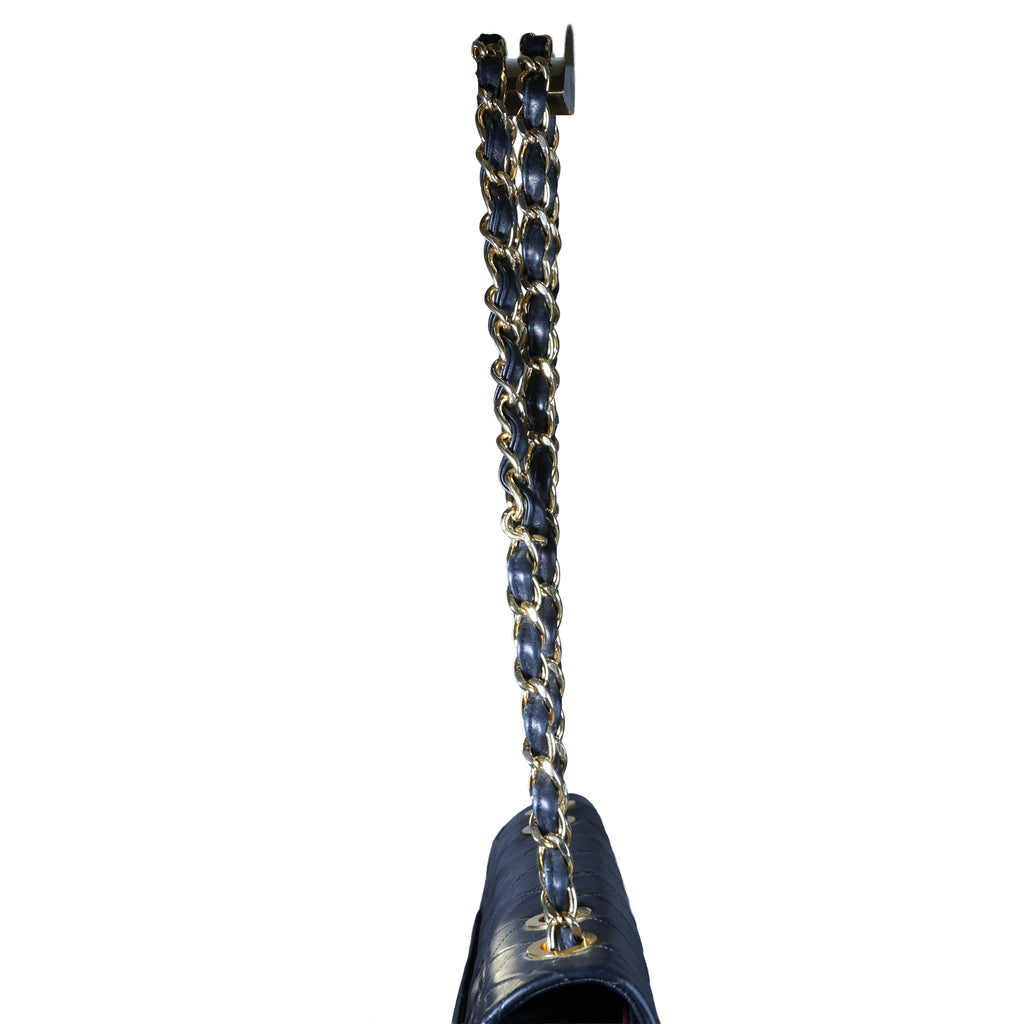 Preowned CHANEL Vintage Matelasse 34 Maxi Classic Flap Black GHW | Luxe Again Maison