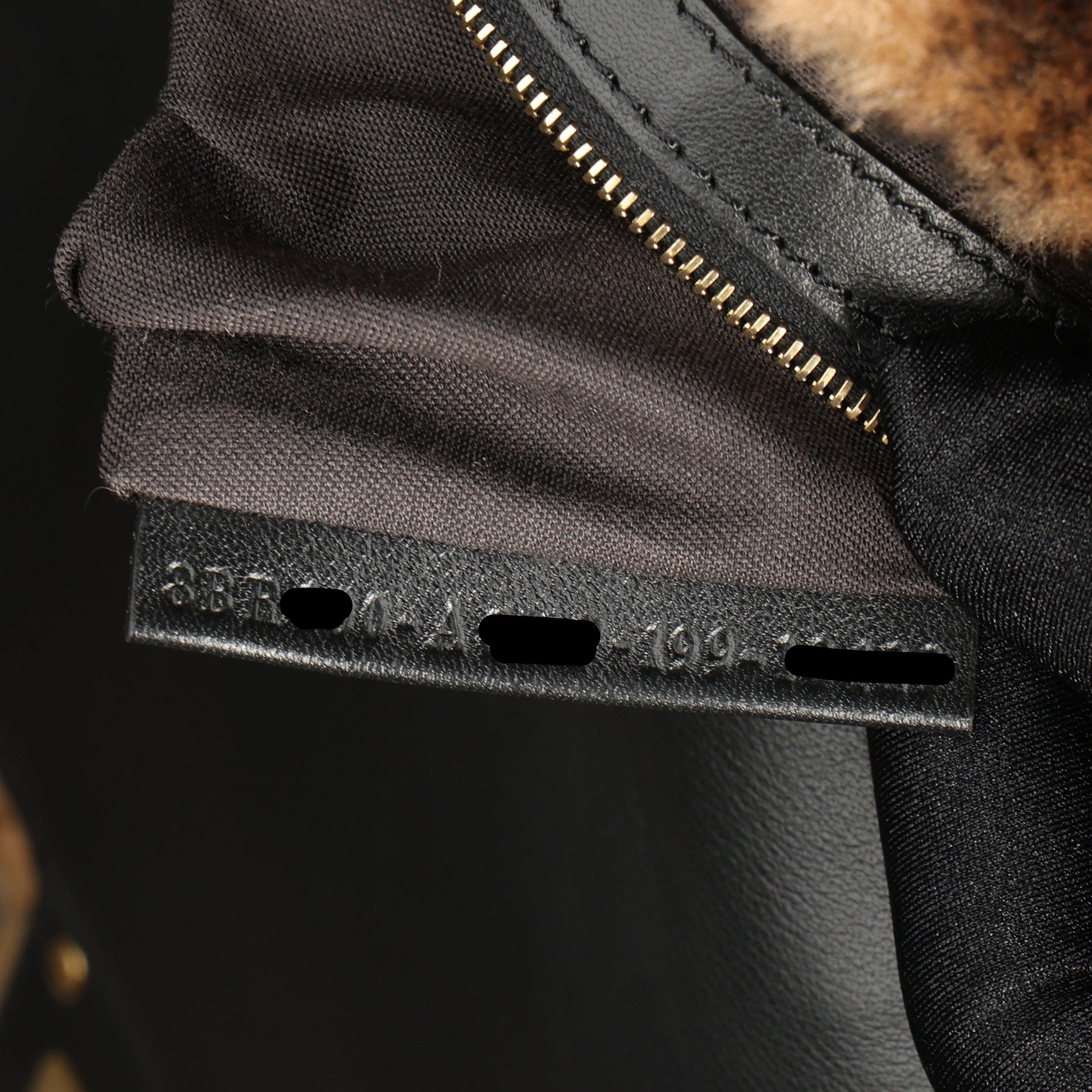 Preowned FENDI Zucca Baguette Fur x Leather Brown Bag 8BXX00 | Luxe Again Maison