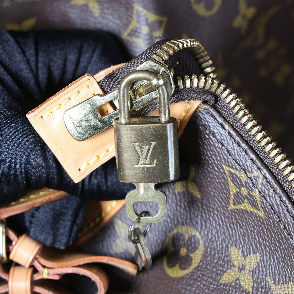 Preowned LOUIS VUITTON Vintage Cruiser 50 Monogram Travel Bag | Luxe Again Maison