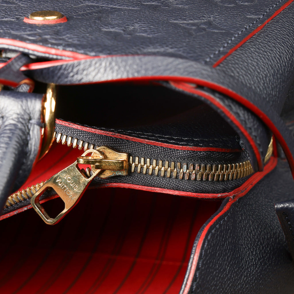 Preowned LOUIS VUITTON Montaigne MM Monogram Empreinte Leather Navy Blue | Luxe Again Maison