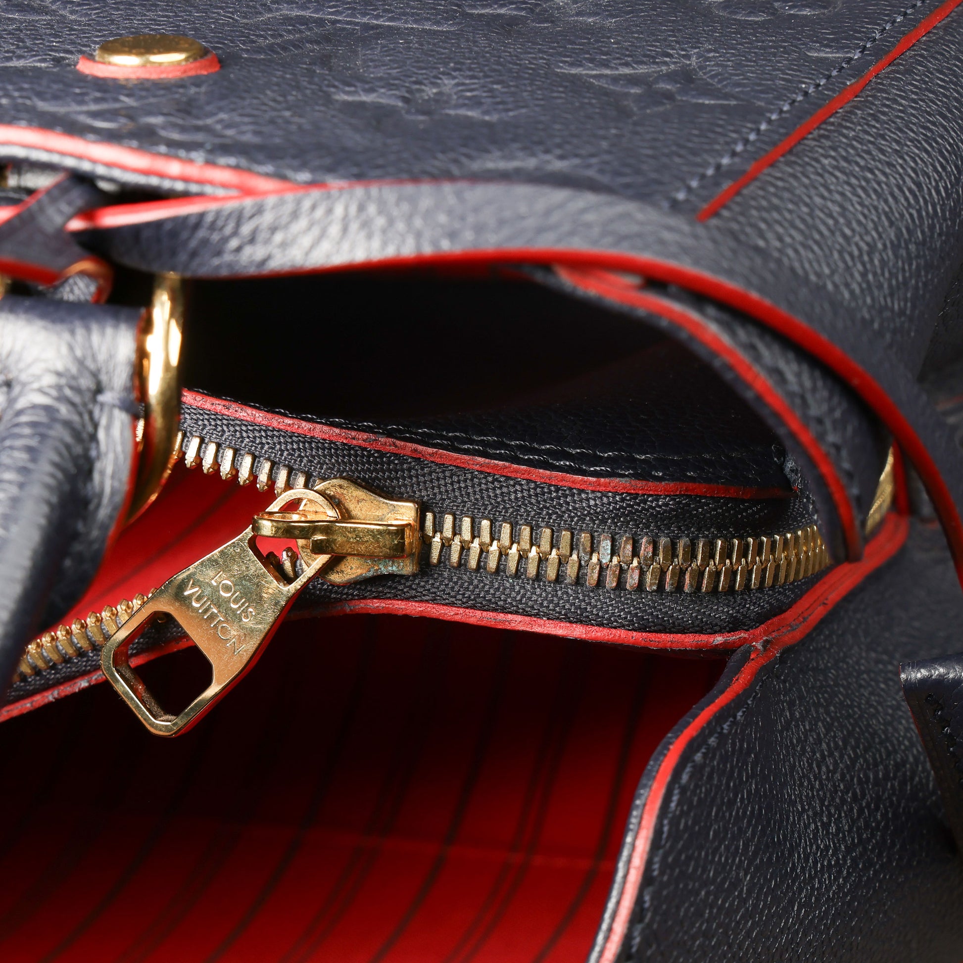 Preowned LOUIS VUITTON Montaigne MM Monogram Empreinte Leather Navy Blue | Luxe Again Maison