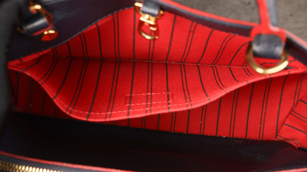 Preowned LOUIS VUITTON Montaigne MM Monogram Empreinte Leather Navy Blue | Luxe Again Maison