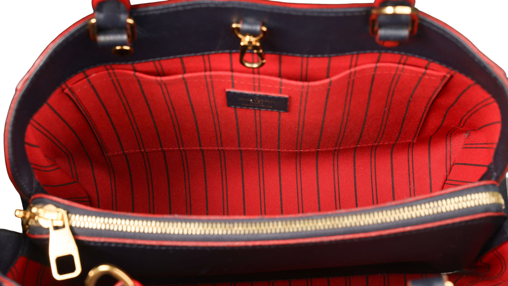 Preowned LOUIS VUITTON Montaigne MM Monogram Empreinte Leather Navy Blue | Luxe Again Maison
