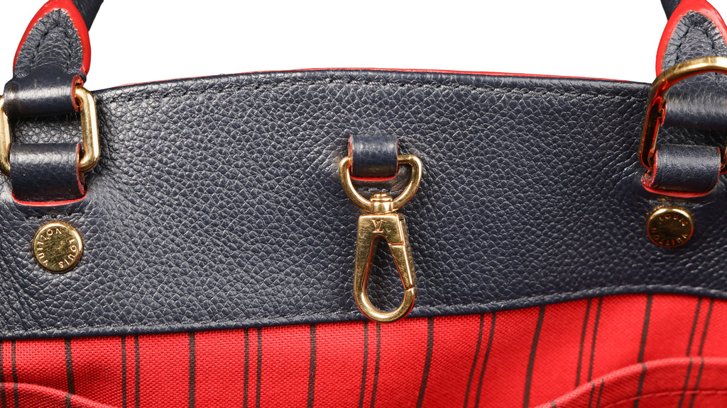Preowned LOUIS VUITTON Montaigne MM Monogram Empreinte Leather Navy Blue | Luxe Again Maison
