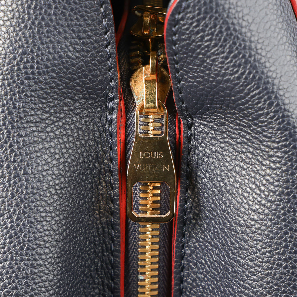 Preowned LOUIS VUITTON Montaigne MM Monogram Empreinte Leather Navy Blue | Luxe Again Maison