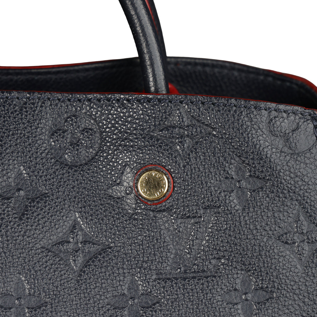 Preowned LOUIS VUITTON Montaigne MM Monogram Empreinte Leather Navy Blue | Luxe Again Maison