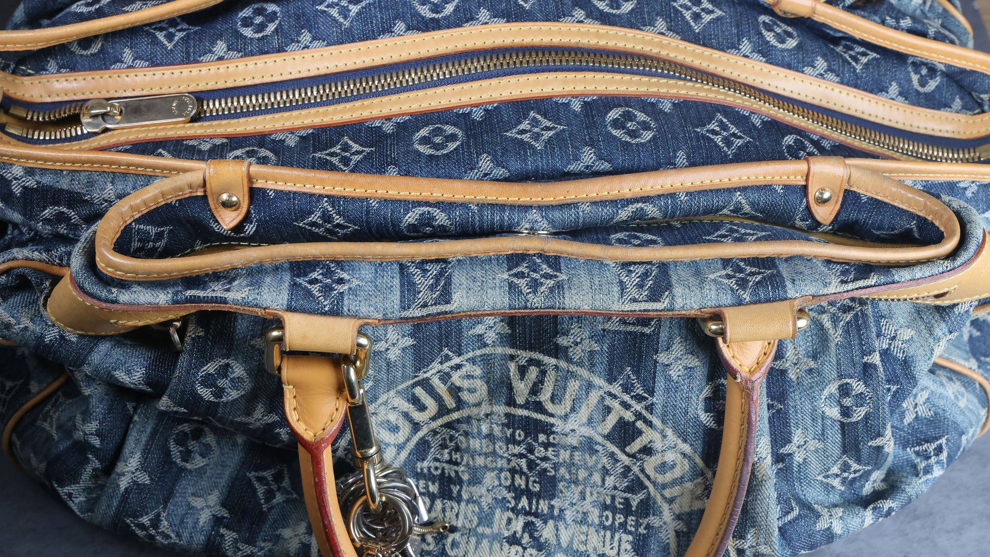 Preowned LOUIS VUITTON Vintage Denim Cabas Raye GM Monogram Blue w Charms | Luxe Again Maison