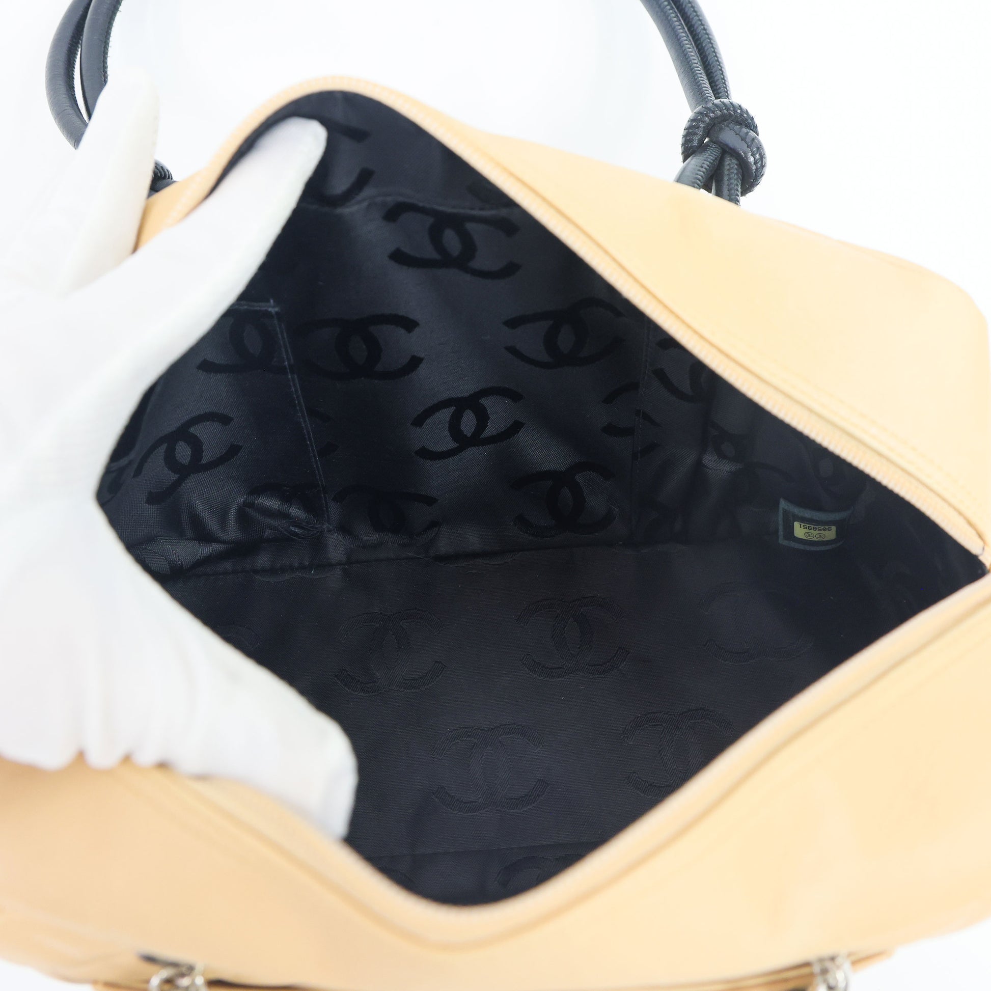 Preloved CHANEL Cambon Ligne Bowler Bag Beige & Black | Luxe Again Maison