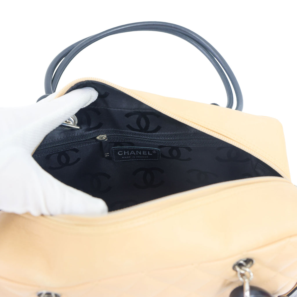 Preloved CHANEL Cambon Ligne Bowler Bag Beige & Black | Luxe Again Maison