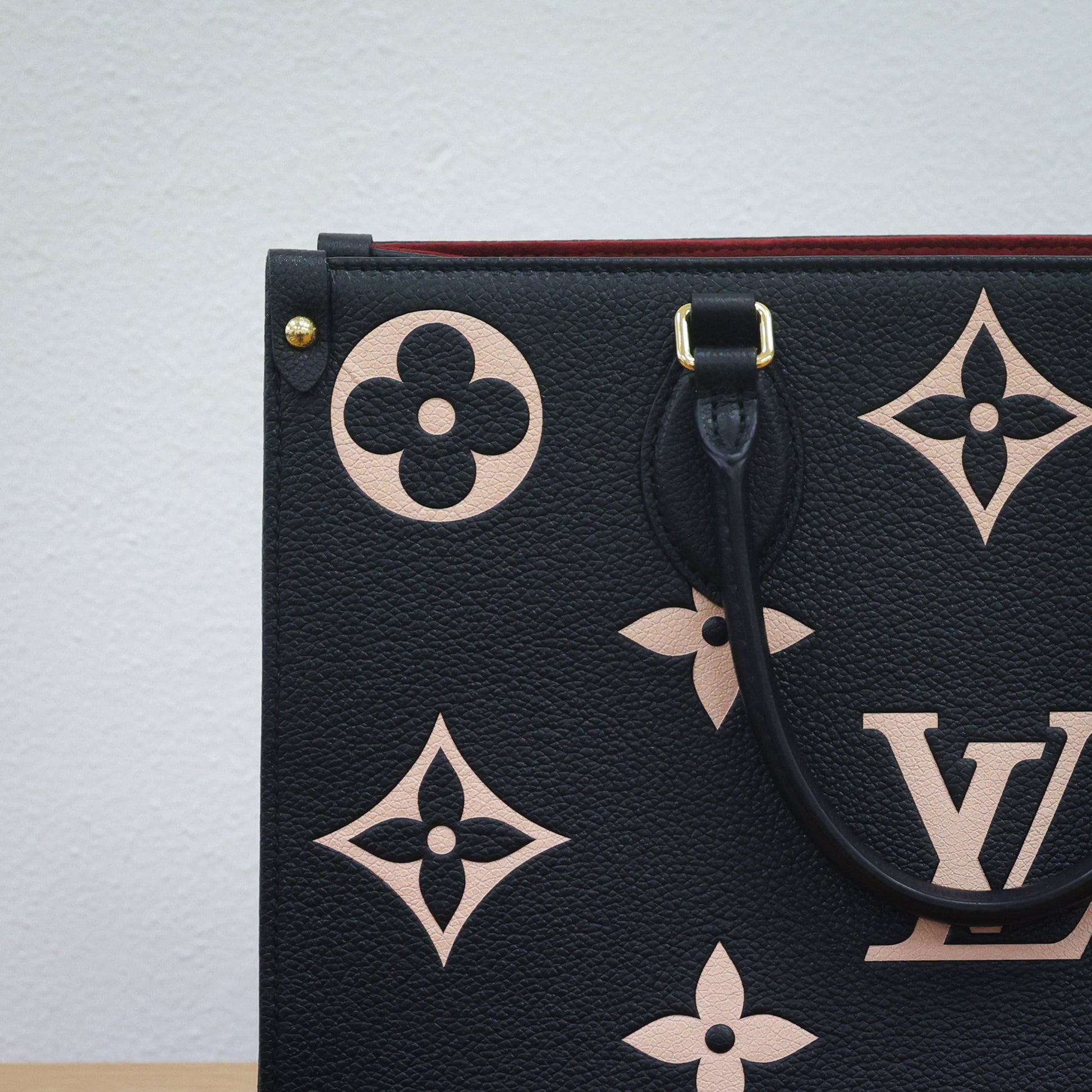 Preloved authentic LOUIS VUITTON On the Go MM M45495 Bicolor Black Monogram Empreinte Leather Tote Bag | Luxe Again Maison