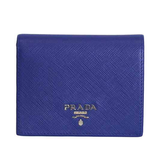Pre-owned authentic PRADA 2018 Saffiano Leather Navy Bi-fold Clasp Slim Wallet 1M0204 | Box + G Card | Luxe Again Maison